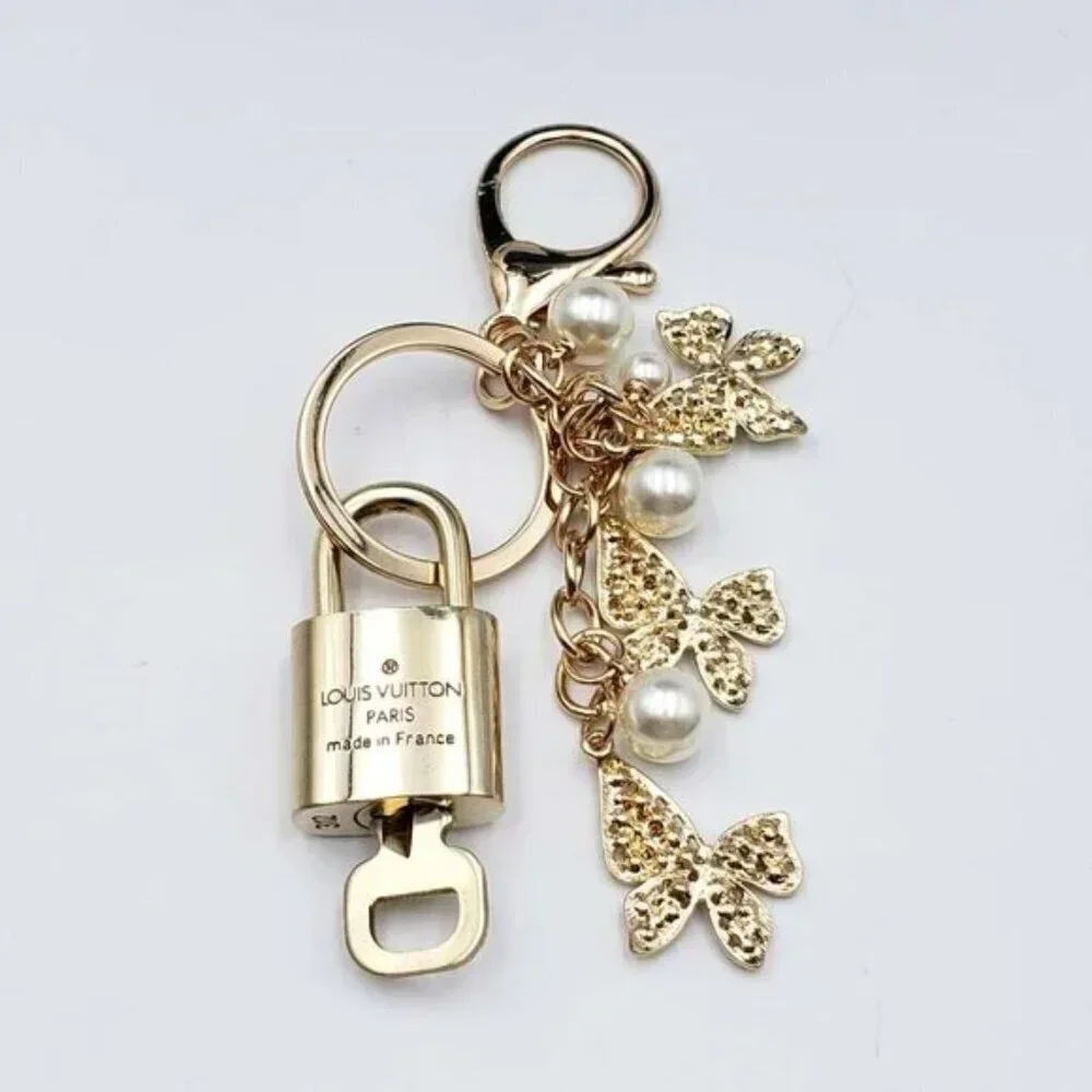 LV Gold Padlock Authentic 🔑 Luxury Bag Charm w/ Unbranded Butterfly Keychain - Picture 4 of 5